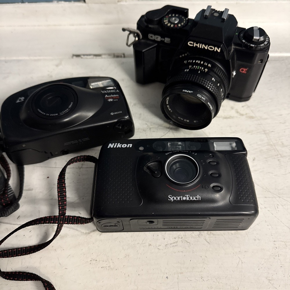 Lot Of 3 Cameras Nikon + Yashica + Chinon CM-7 35mm SLR Camera w/Lens Untested